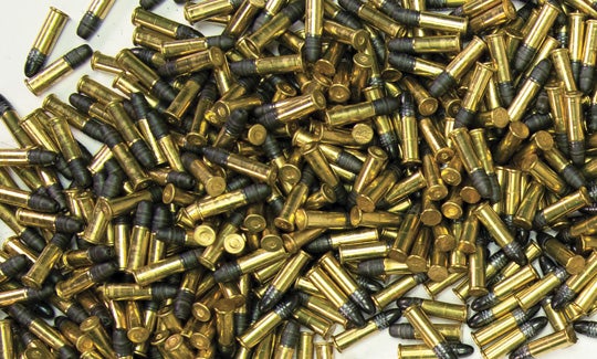 pile of long rifle ammunition cartridges