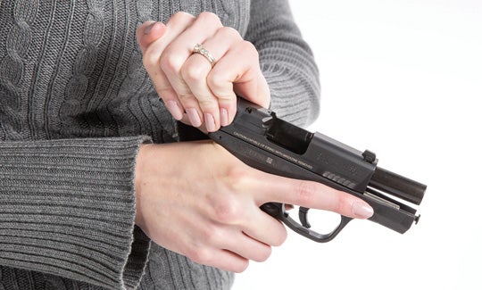 racking a pistol slide