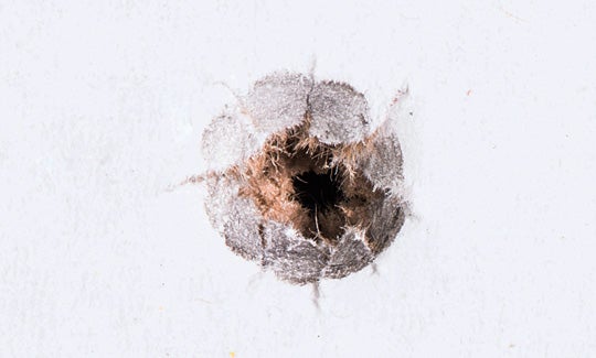 wall that bullet has passed through